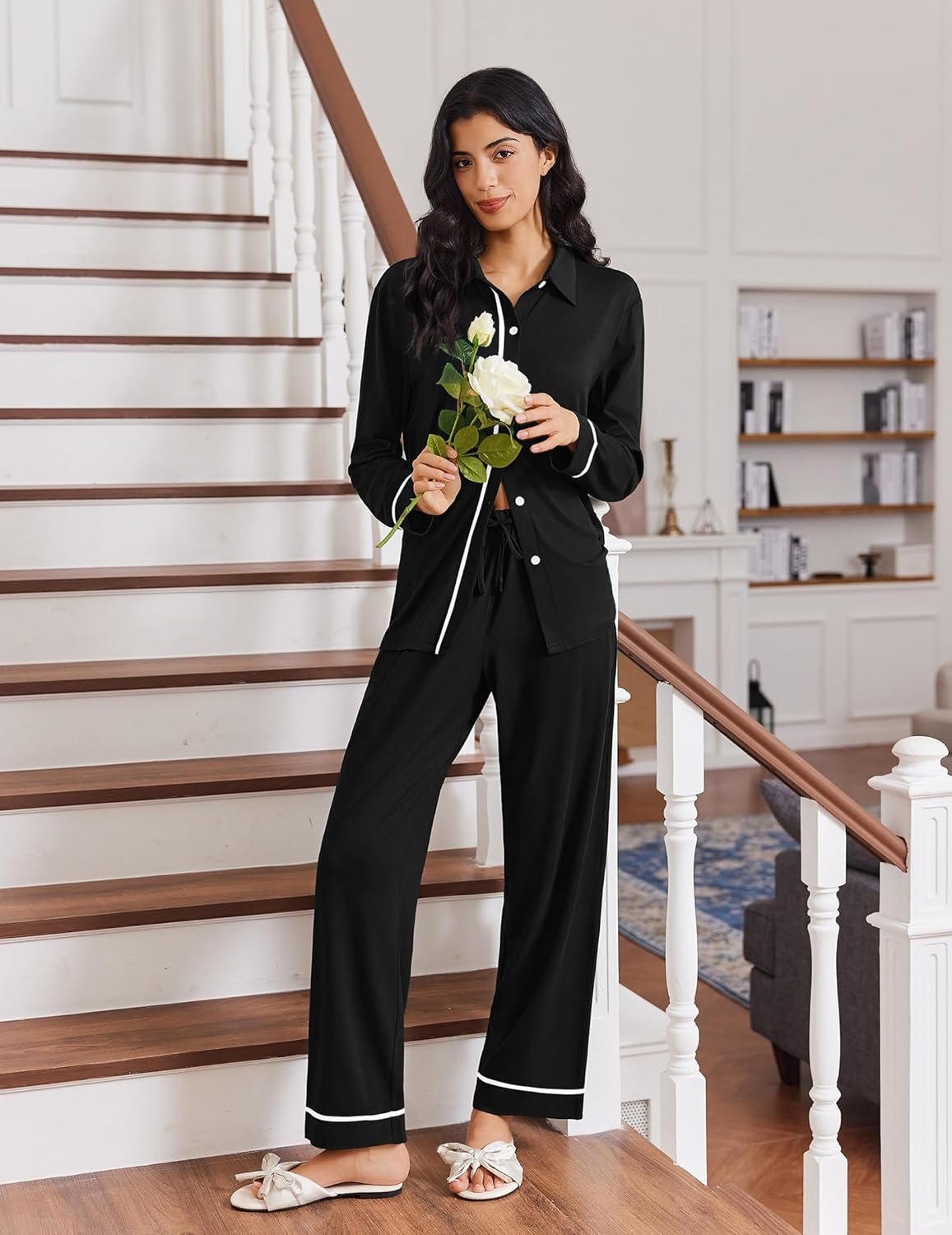 Black button-down long-sleeve pajama set with matching pants and white piping