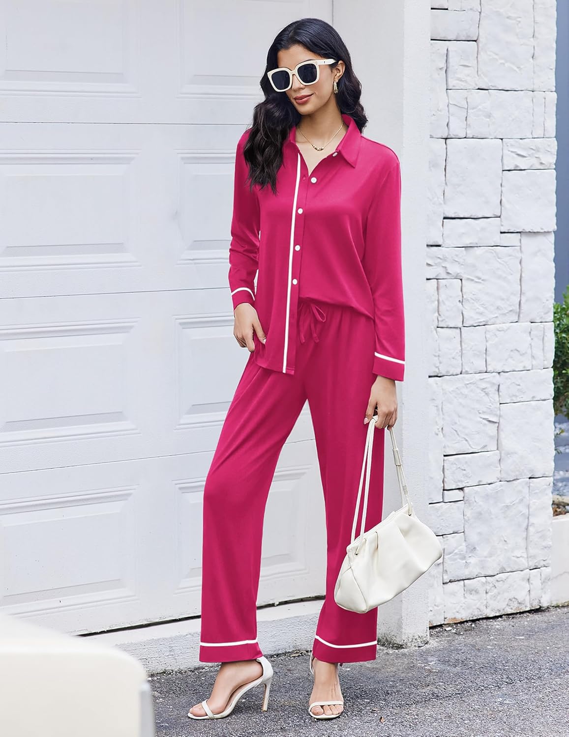 Fuchsia pink button-down pajama set with side stripes and matching long pants