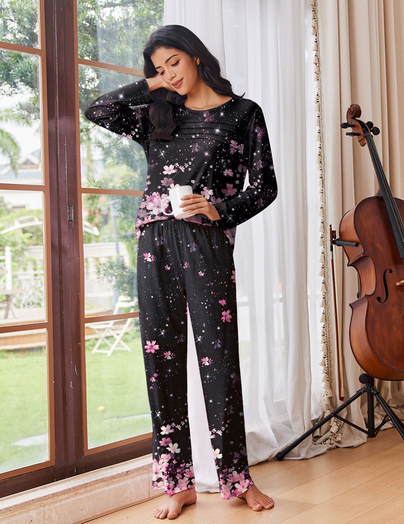 Conjunto de pijama negro con flores rosa, top de manga larga y pantalones largos