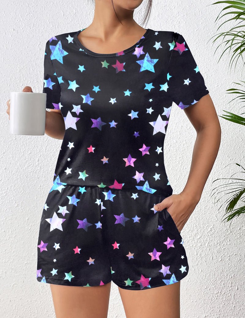 Black short-sleeve pajama set with multicolor star print, matching shorts