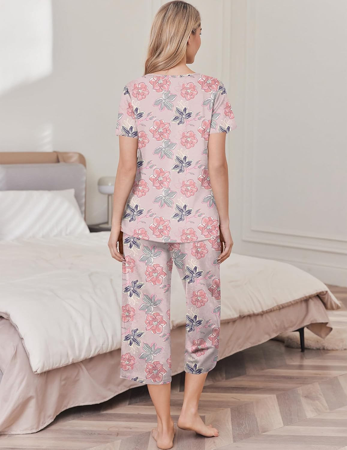Pink floral pajama set with short-sleeve top and knee-length capri pants