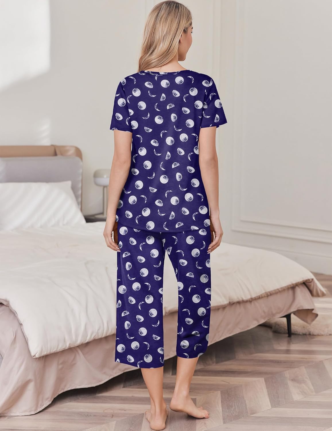 Navy cotton pajama set with short-sleeve top and capri pants, back view, circle print