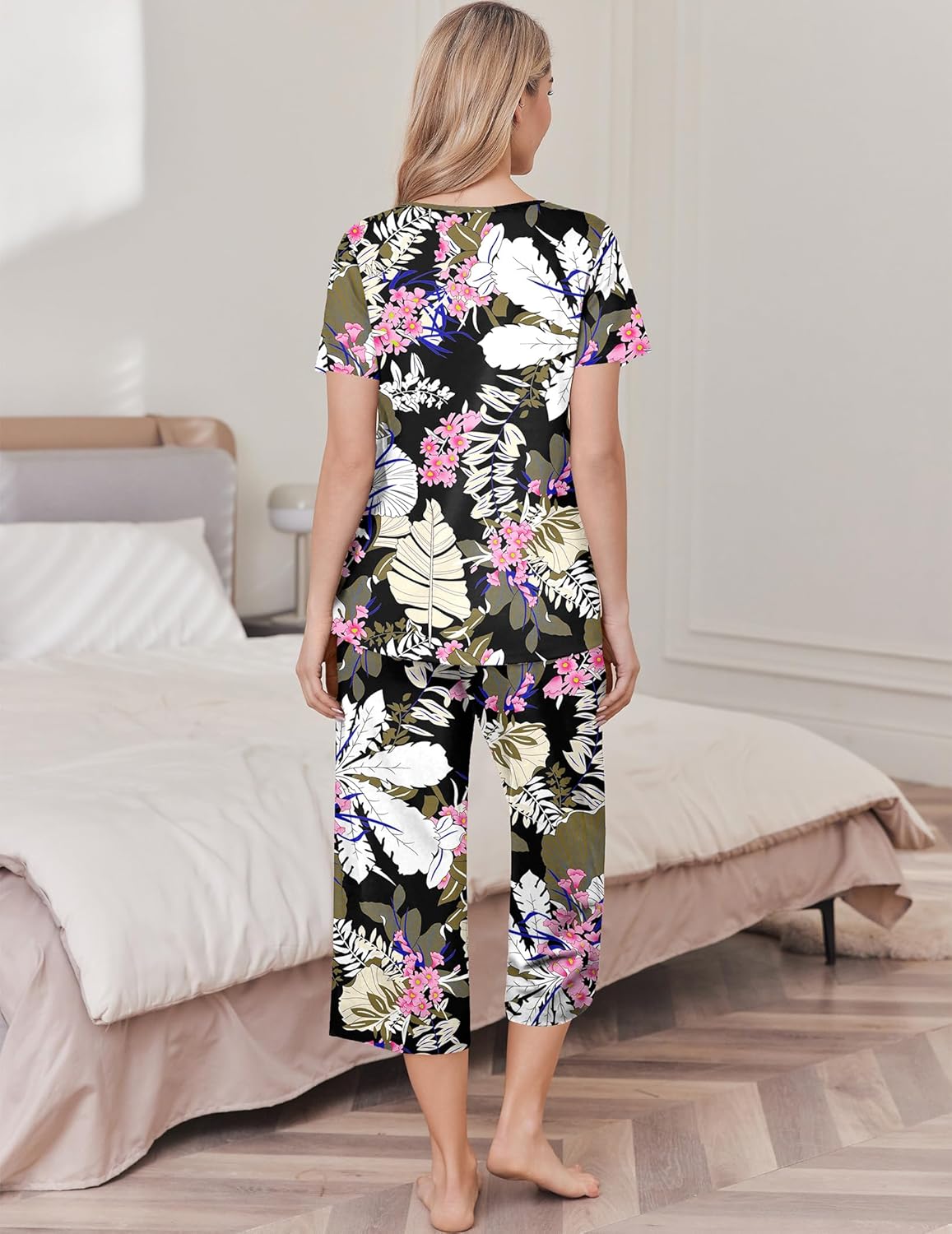 Women's cotton pajama set with black top and capri pants, multicolor floral leaf print (back)