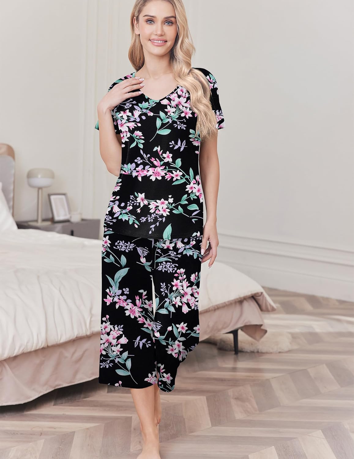 Soft cotton pajama set with short-sleeve top and capri pants in black floral print