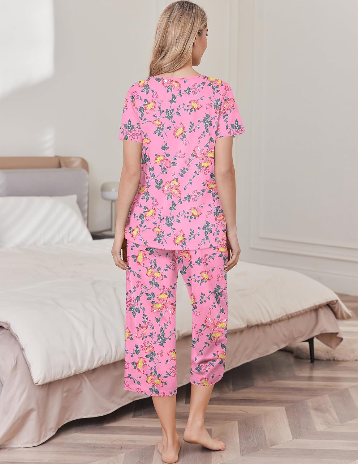 Pink floral cotton pajama set with short-sleeve top and capri pants, back view