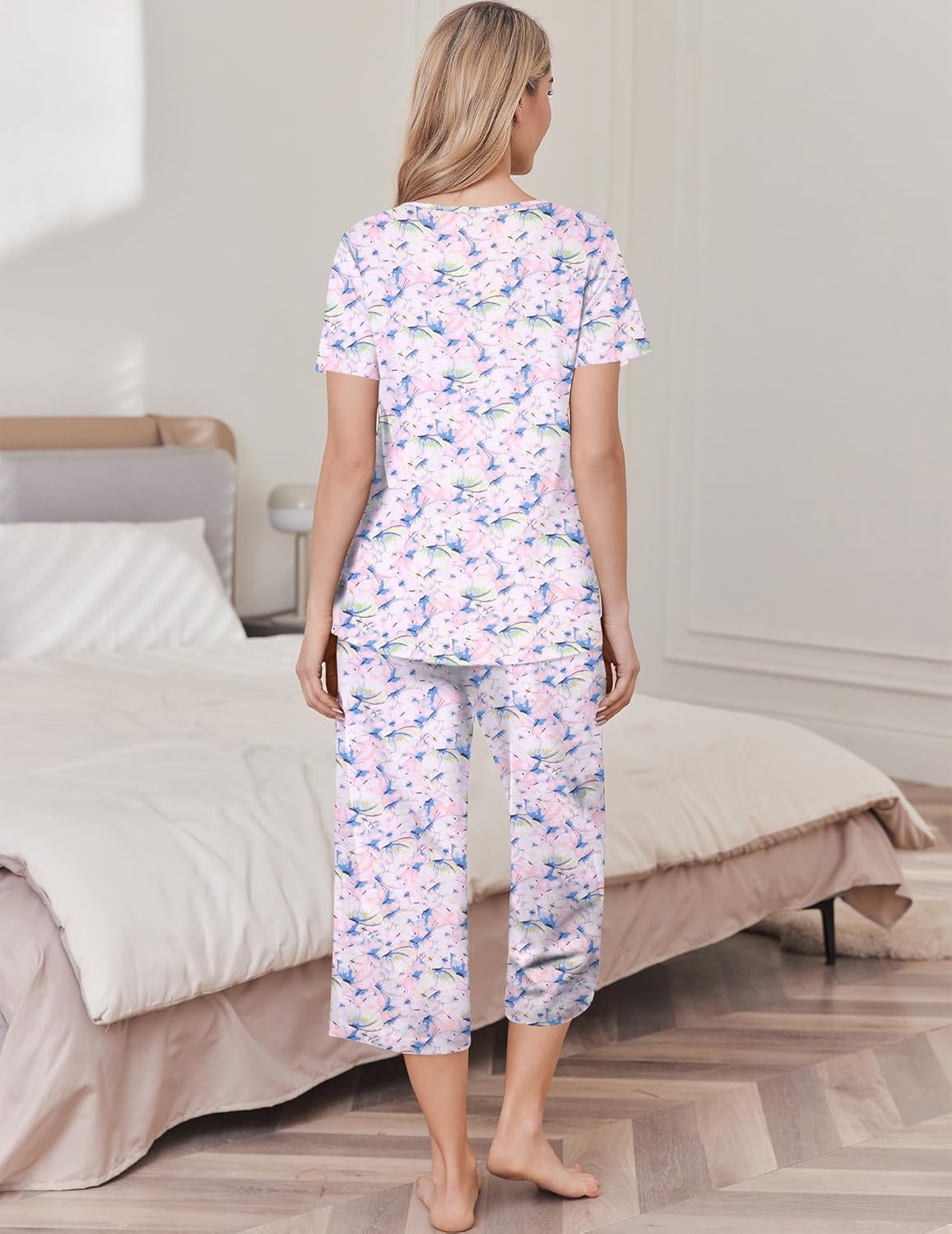 Cotton pajama set with light purple floral top and capri pants, back view
