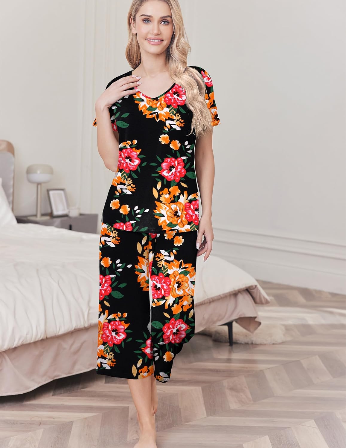 Cotton pajama set with dark floral top and capri pants, short sleeves