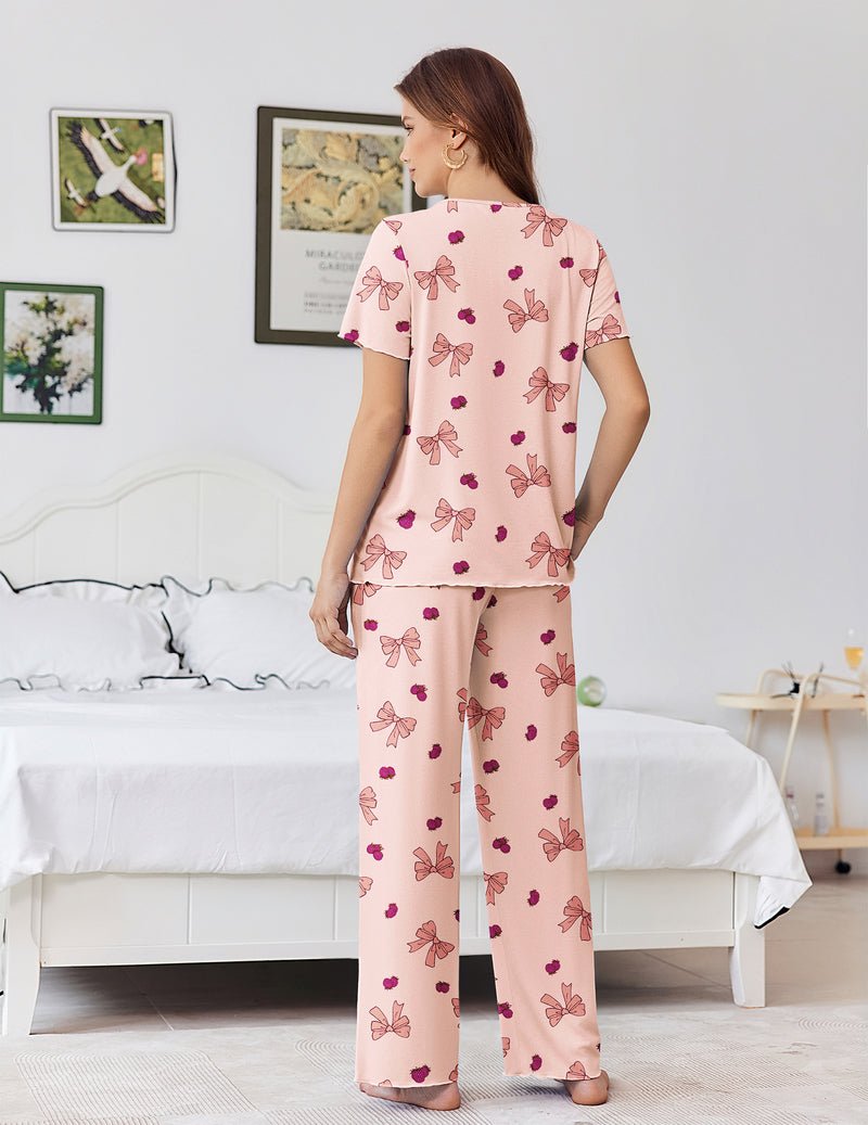 Bamboo viscose pajama set, light pink with bow print, back view of short-sleeve top and wide pants