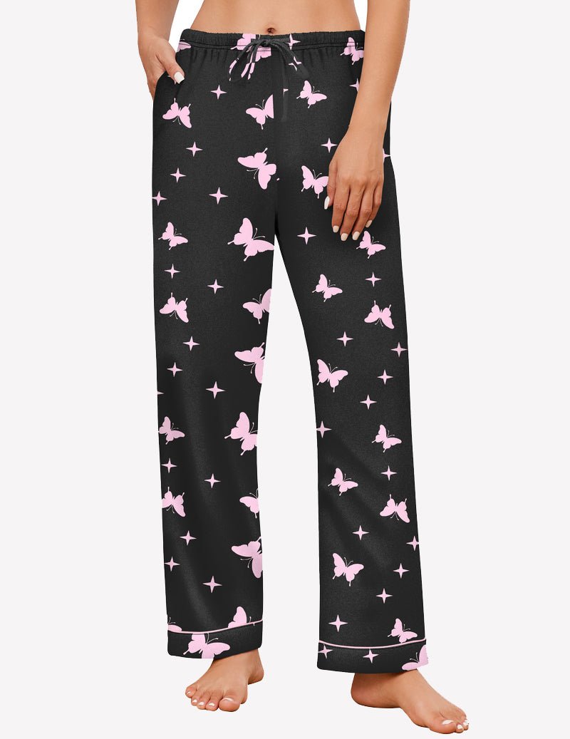 Black pajama pants with pink butterflies and stars, elastic drawstring waist