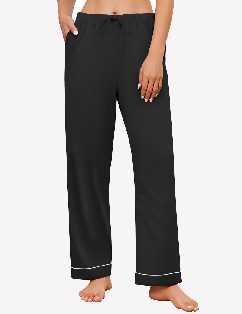 Black pajama pants with elastic drawstring waist and contrast cuff trim
