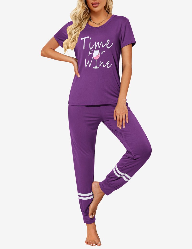 Purple 2-piece pajama set with “Time for Wine” text and white striped cuffs on pants.