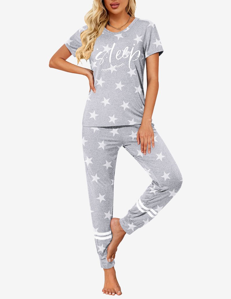 Light grey star print 2-piece pajama set with “Sleep” graphic and white striped cuffs.