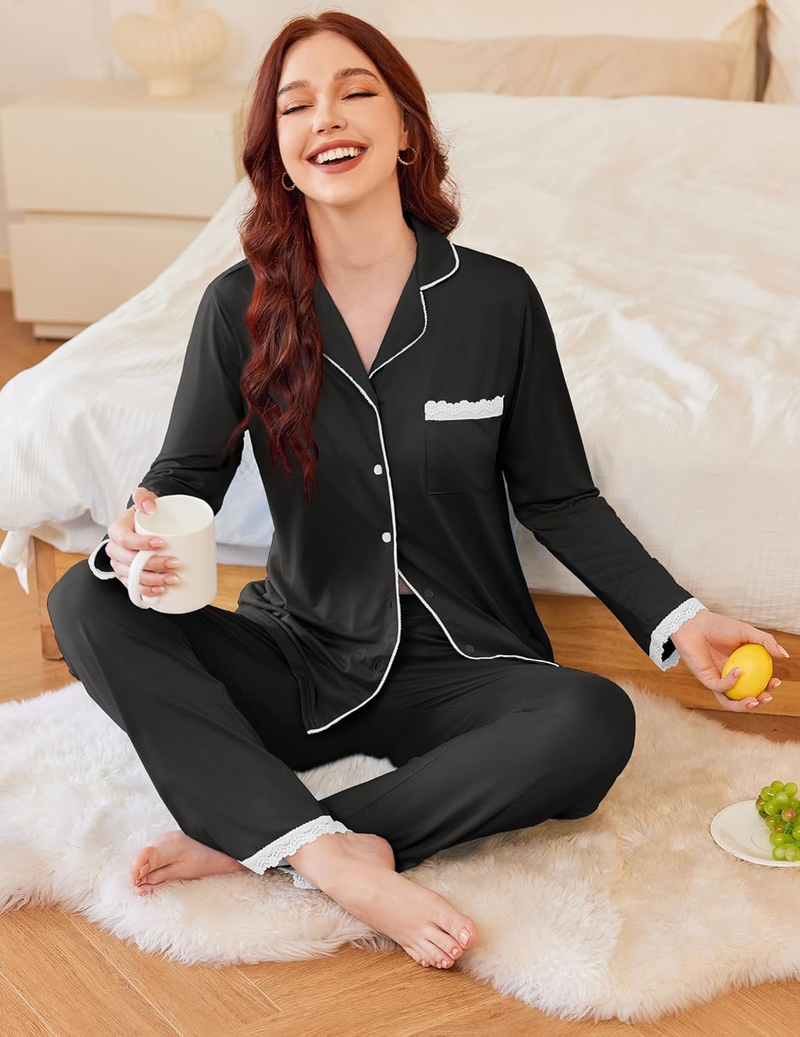 Black long-sleeve button-down pajama set with chest pocket and matching pants