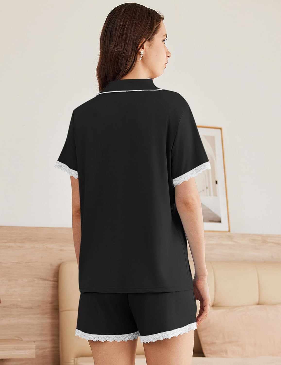 Black pajama set: back view of button-down top with lace-edged shorts