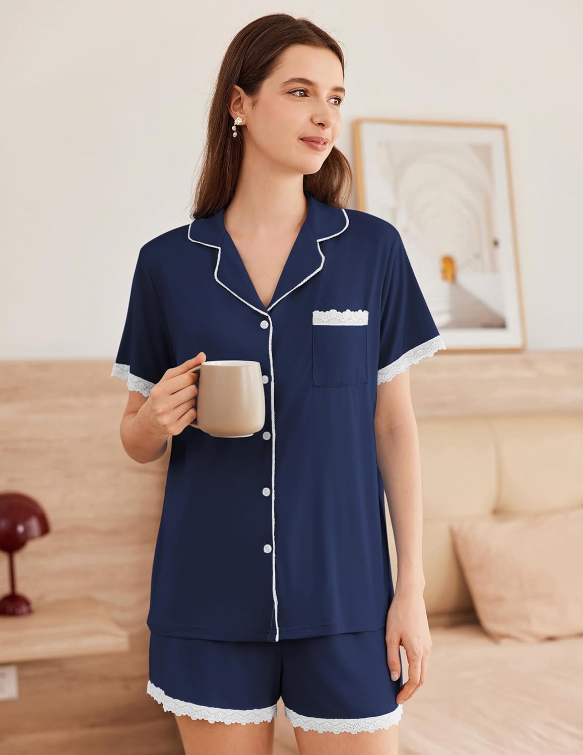 Navy blue pajama set: button-down top with contrast piping and lace trim shorts