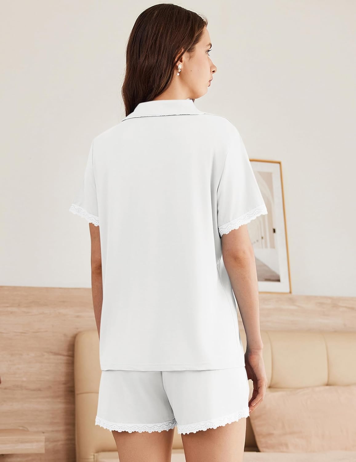 White pajama set, back view: short-sleeve button-down top and lace-trim shorts