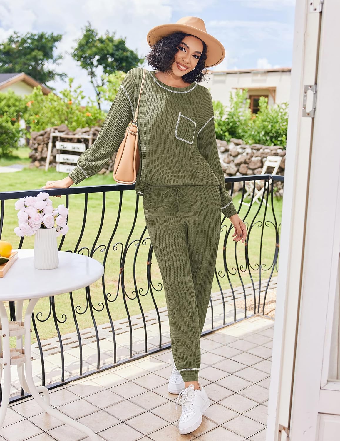 Green waffle knit pajama set with long sleeves, chest pocket, drawstring waist pants