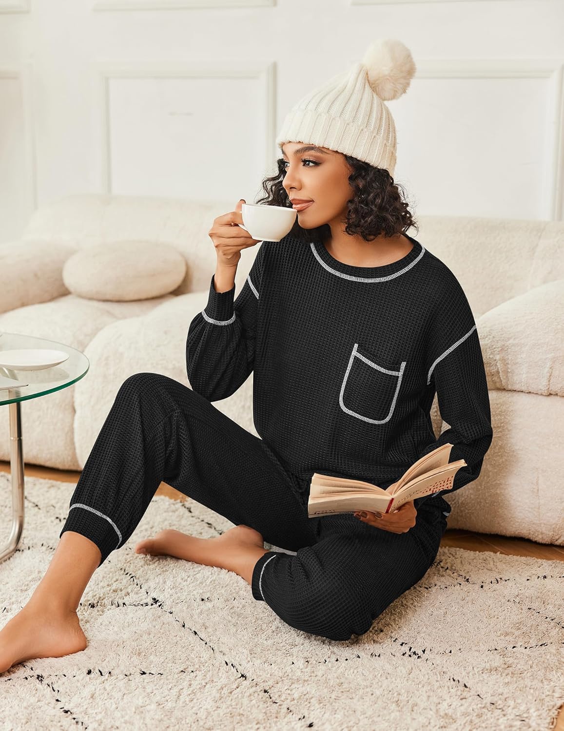 Black waffle knit pajama set with long sleeves, chest pocket, and relaxed drawstring pants