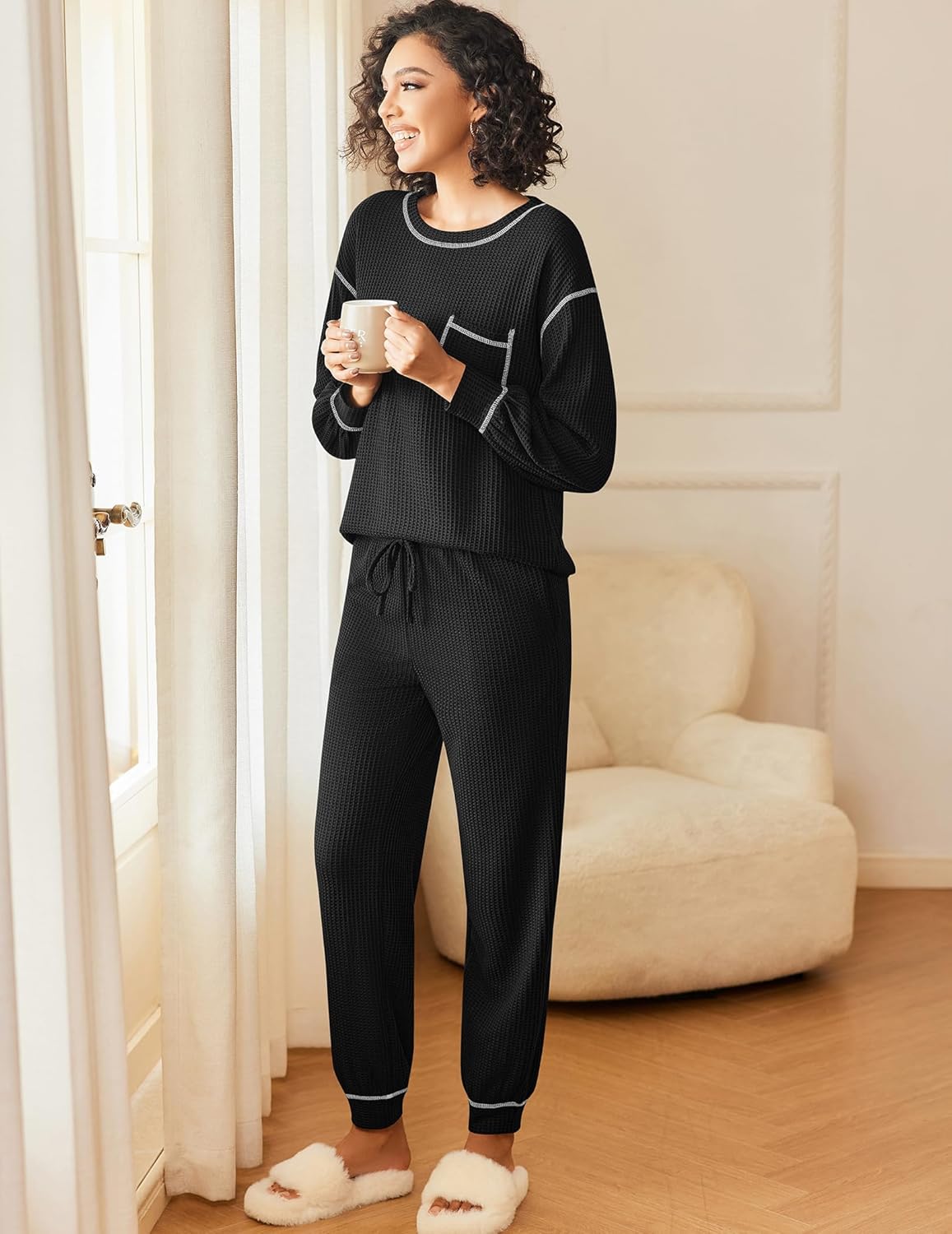 Waffle knit pajama set in black: long sleeve top with pocket and drawstring jogger pants
