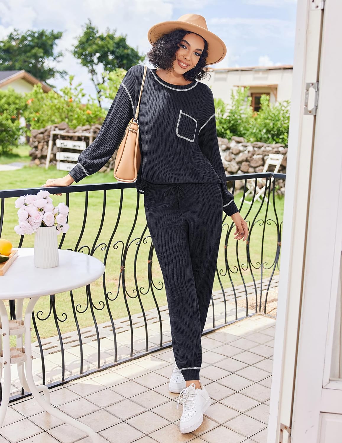 Dark green waffle-knit lounge set with long sleeves, pants, and contrast pocket trim