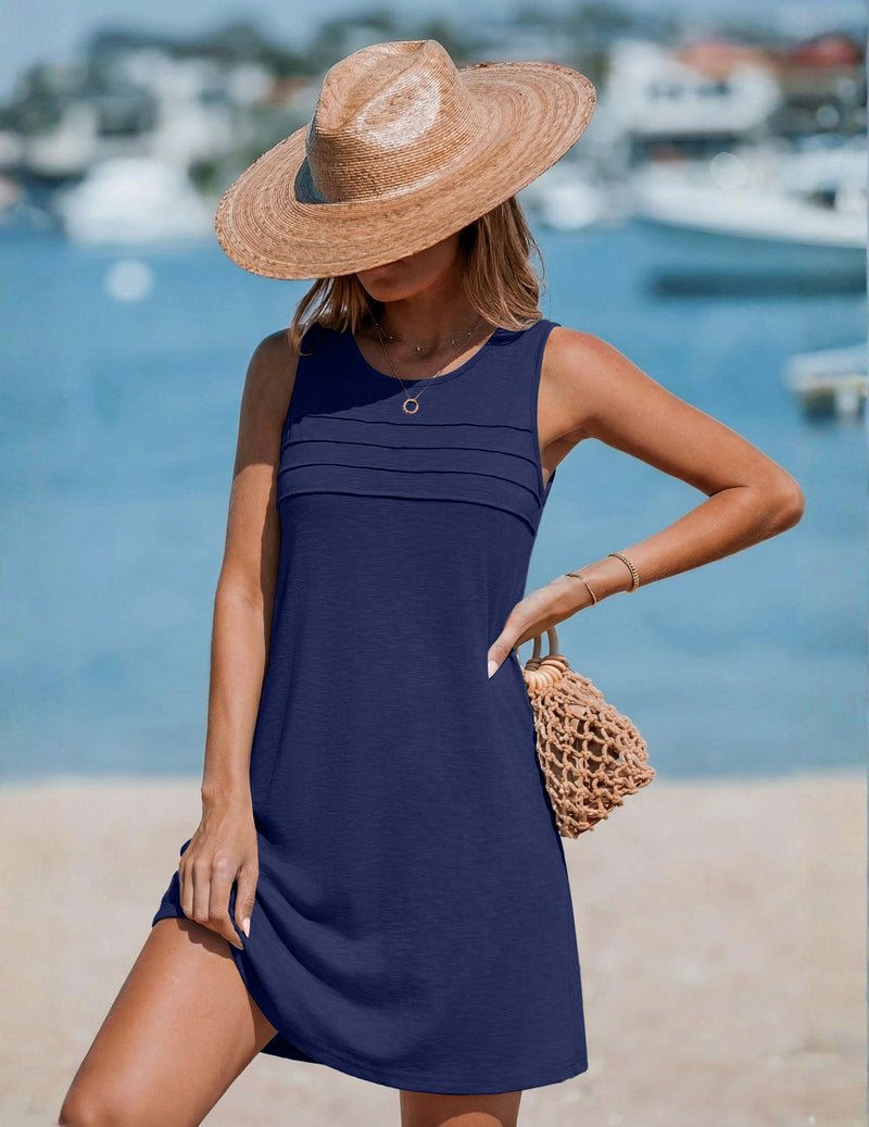 Navy sleeveless tank dress coverup with pleated front and round keyhole neckline