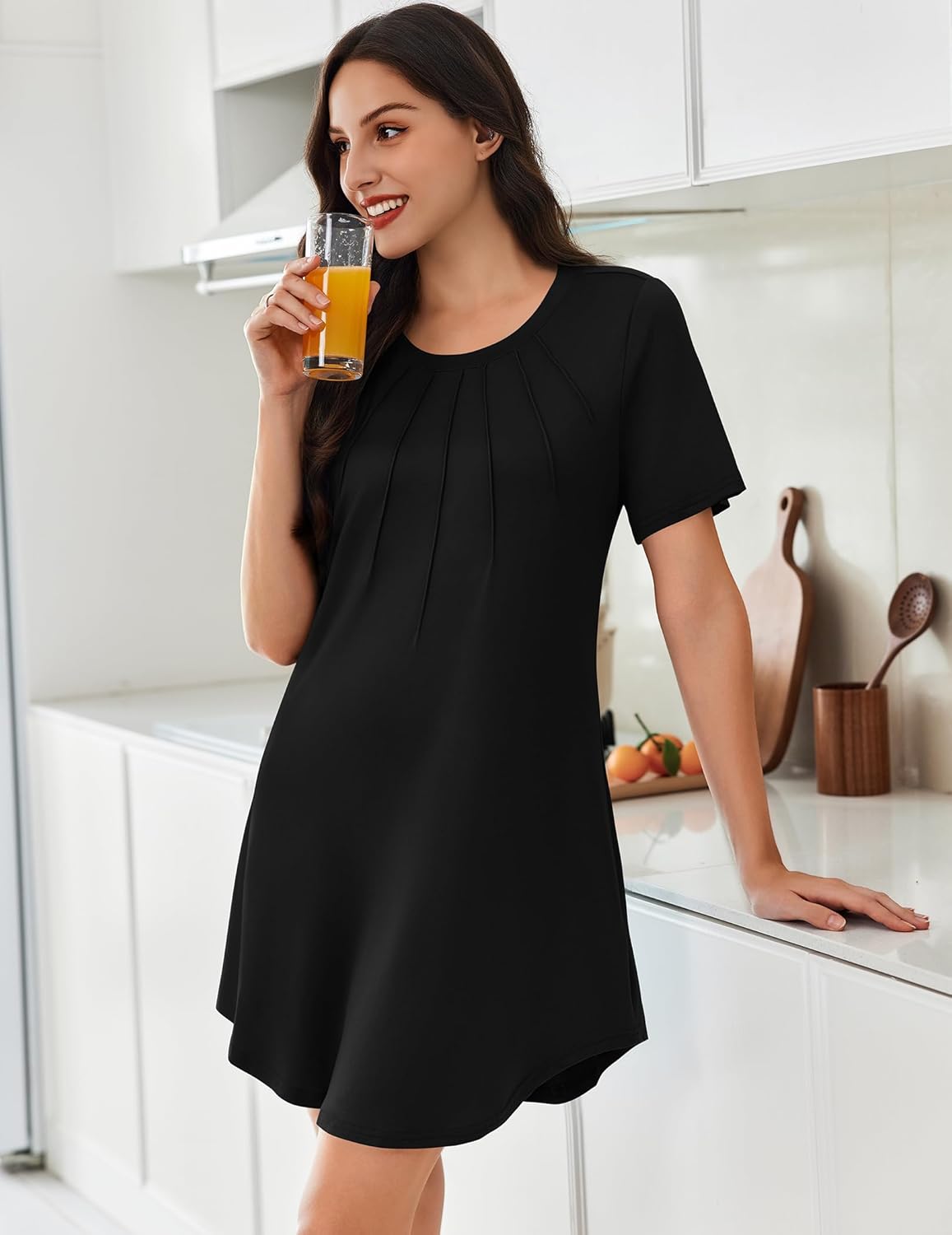 Pleated short-sleeve sleepdress in solid black with round neckline