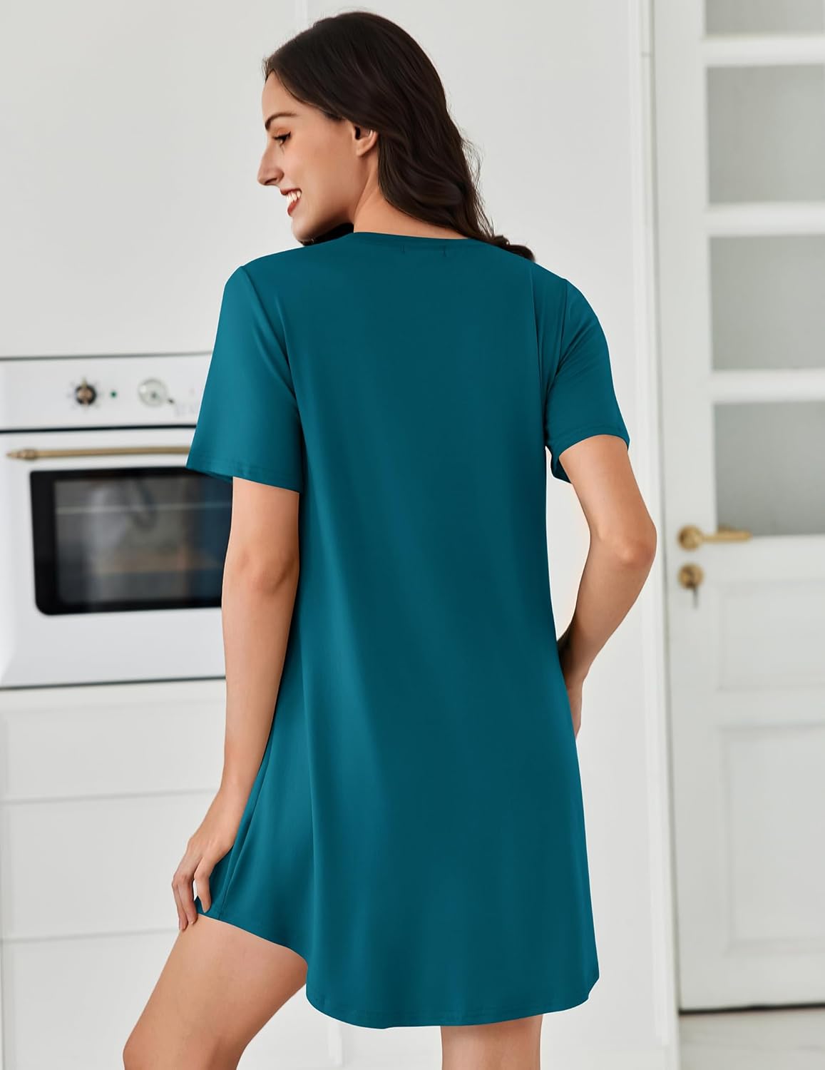 Back view short-sleeve pleated sleepdress, teal-blue solid knit, straight hem