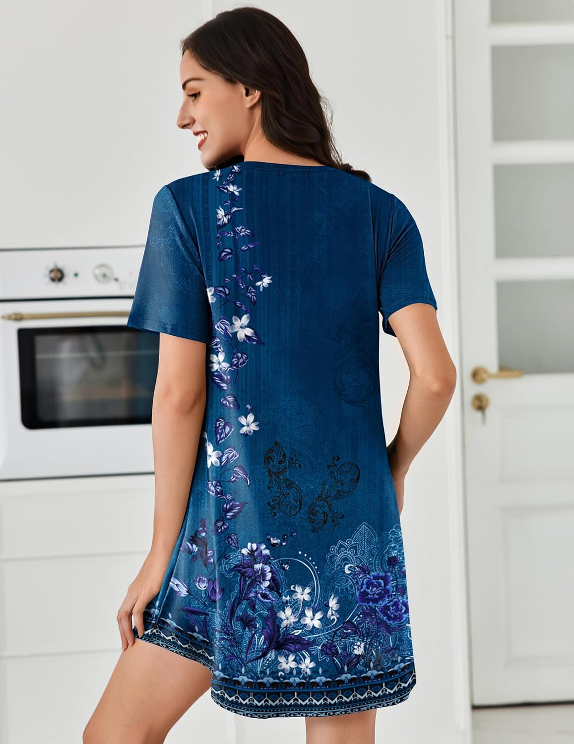Blue floral short-sleeve sleepdress with pleated back yoke and curved hem