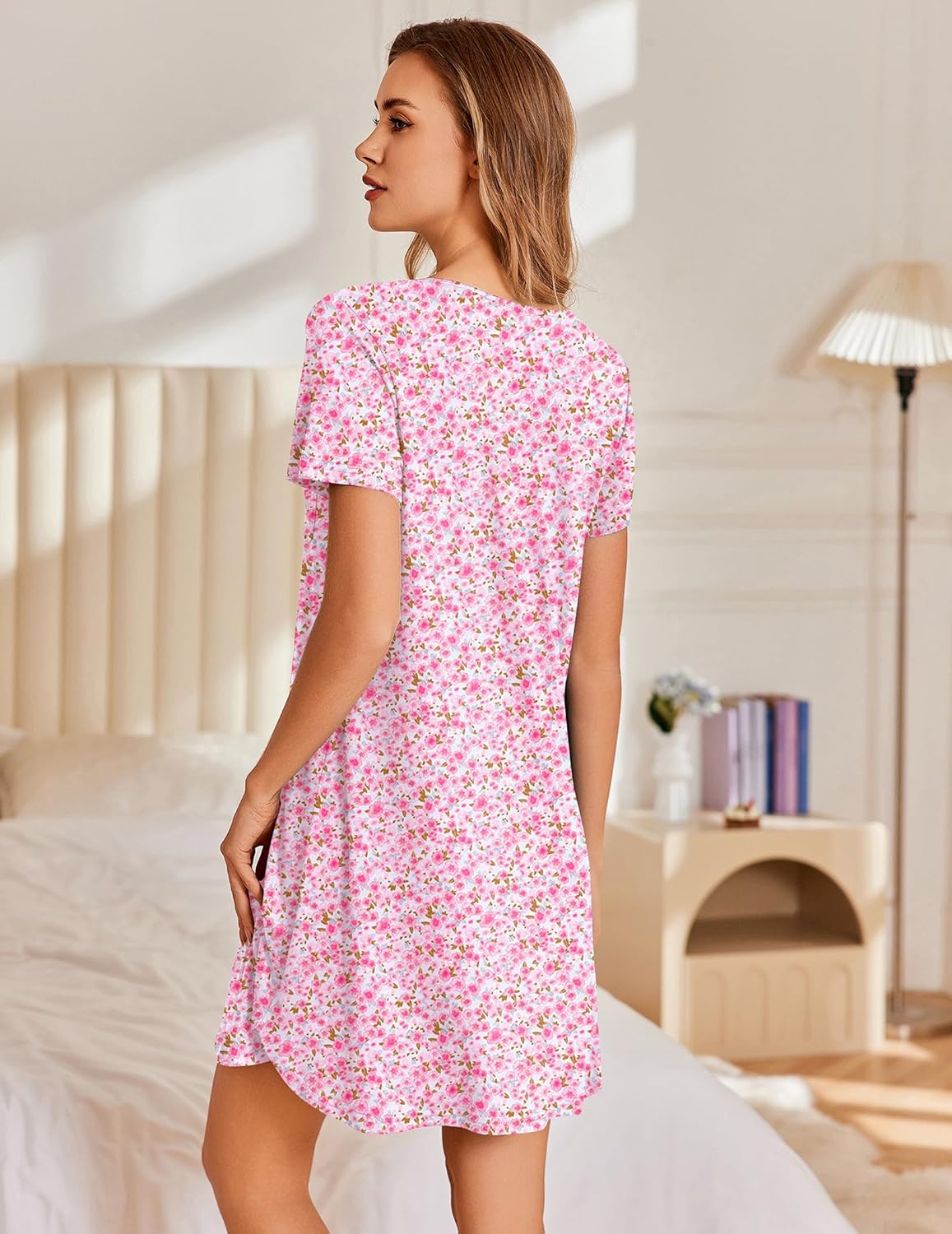 Pink floral short-sleeve nightshirt with relaxed fit and pleated back length