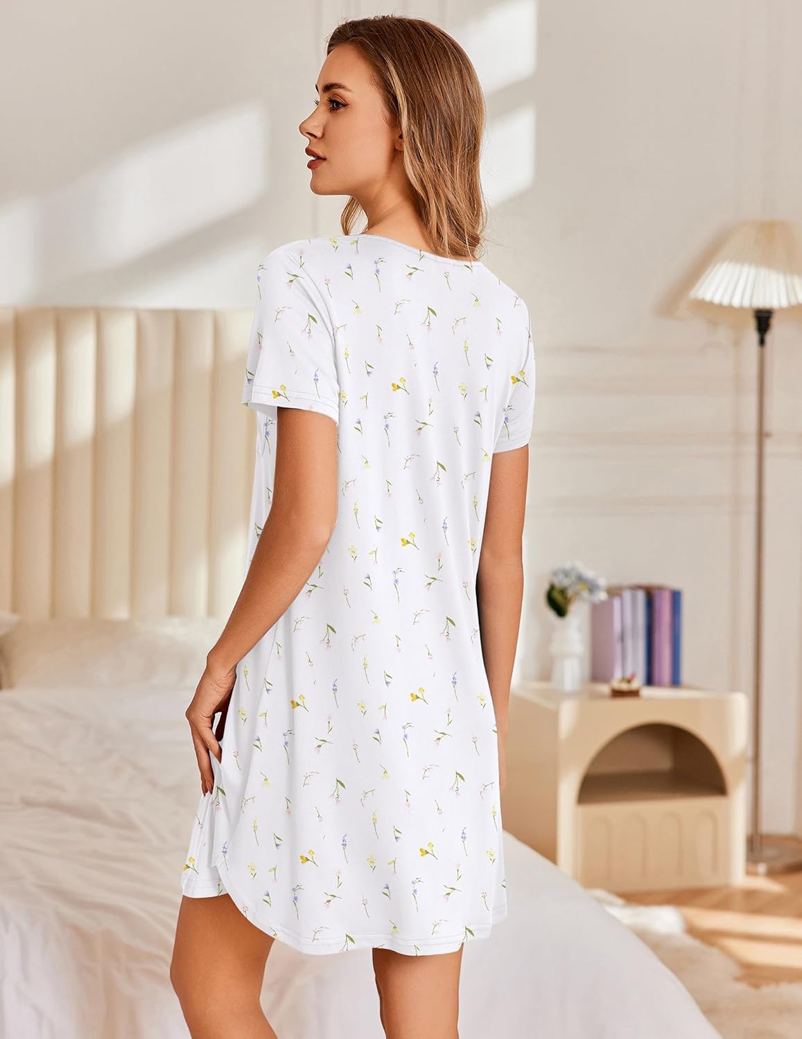White floral short-sleeve nightshirt with relaxed pleated back hem