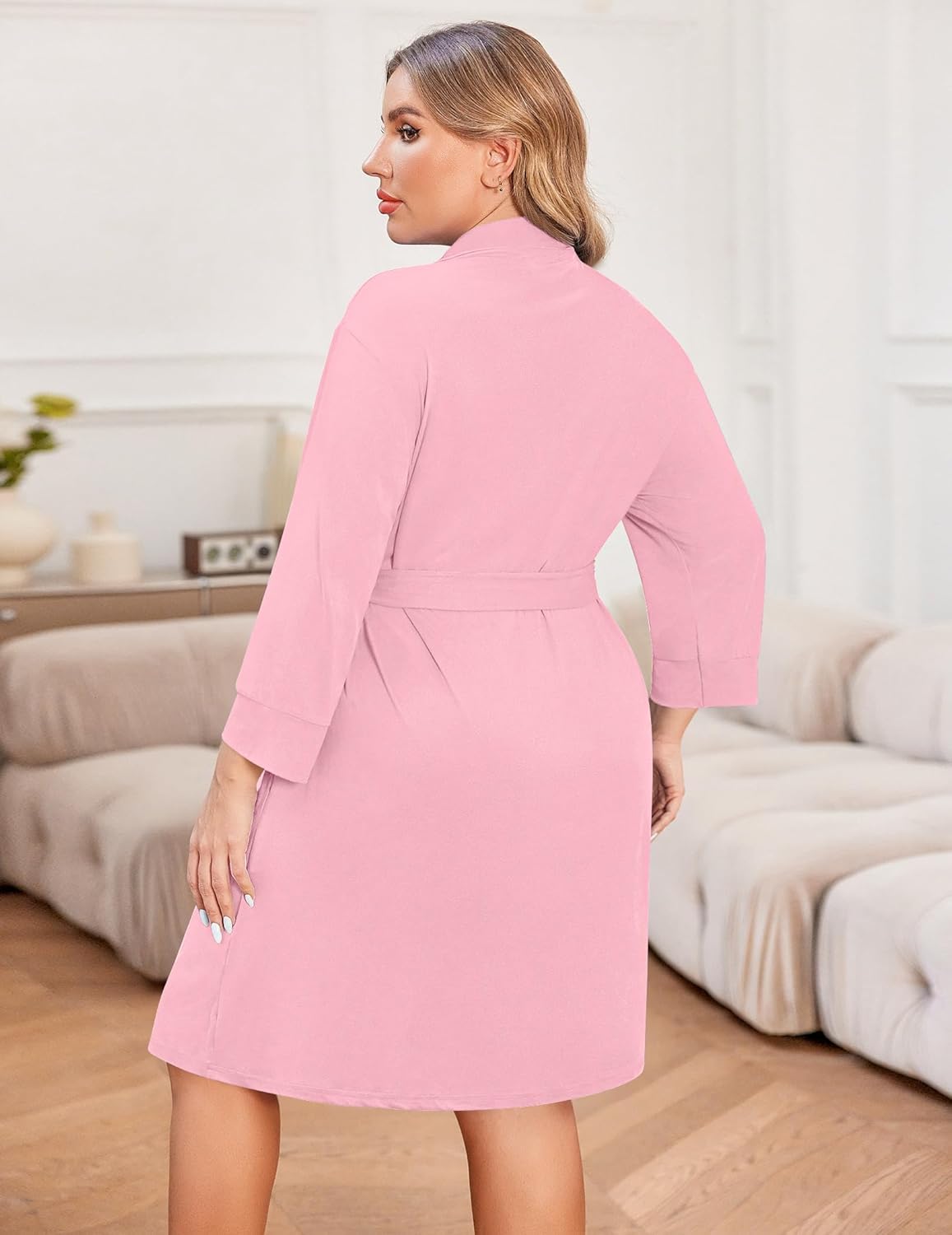 Pink knee-length robe, back view with waist seam and long sleeves