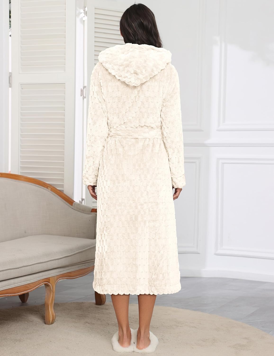 Back view of long hooded plush robe in cream jacquard, tie belt