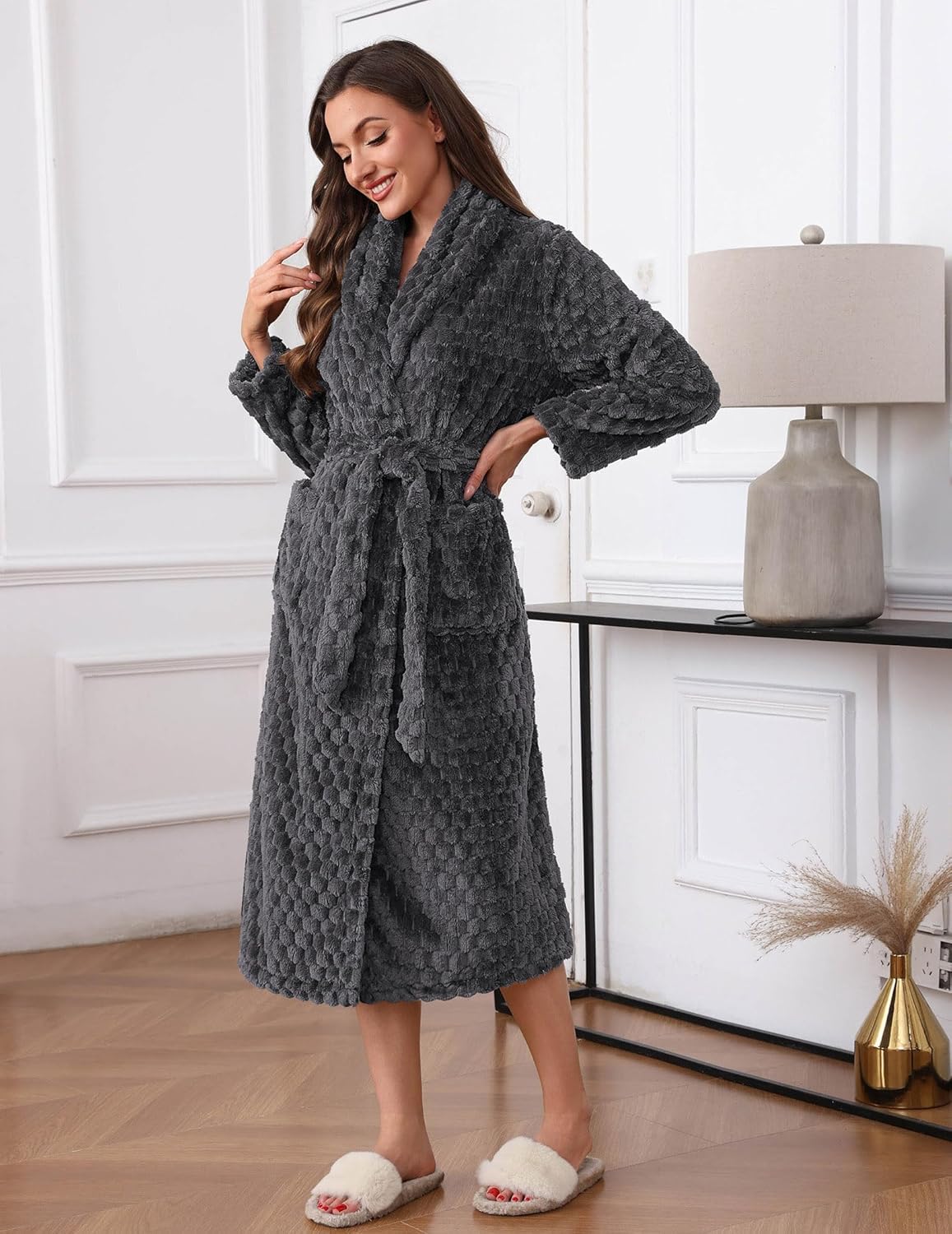 Dark grey plush bathrobe with textured waffle weave and belt tie