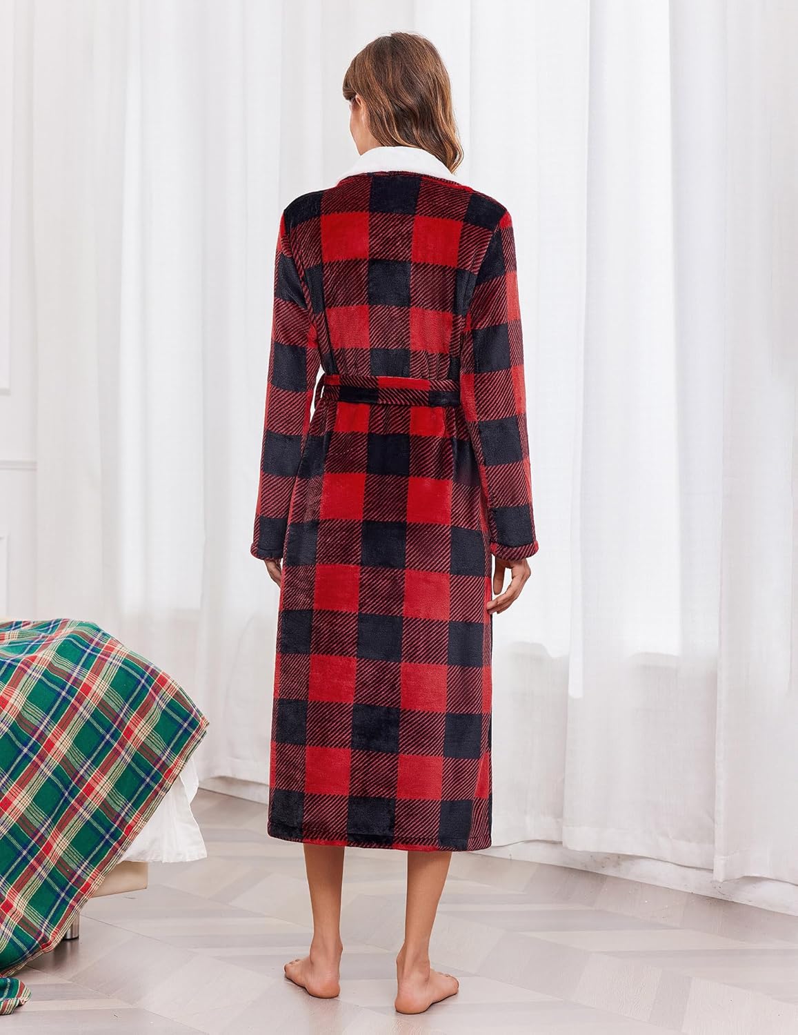Back view of red and black plaid plush robe with tie belt and shawl collar
