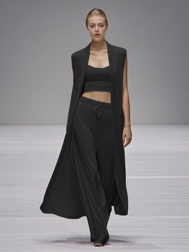 Black 3-piece casual set with open long coat, cropped top, and drawstring wide-leg pants