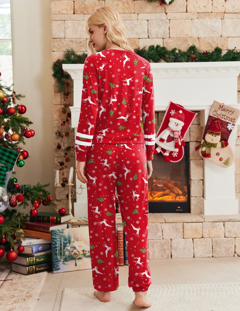 Back view: red reindeer-print long-sleeve pajama set with drawstring waist pants