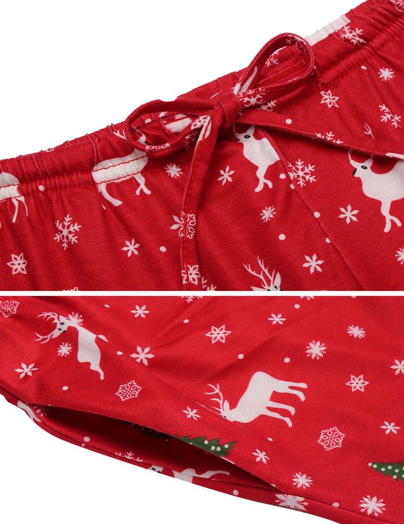 Red reindeer-and-snowflake pajama fabric close-up; elastic waistband and drawcord detail
