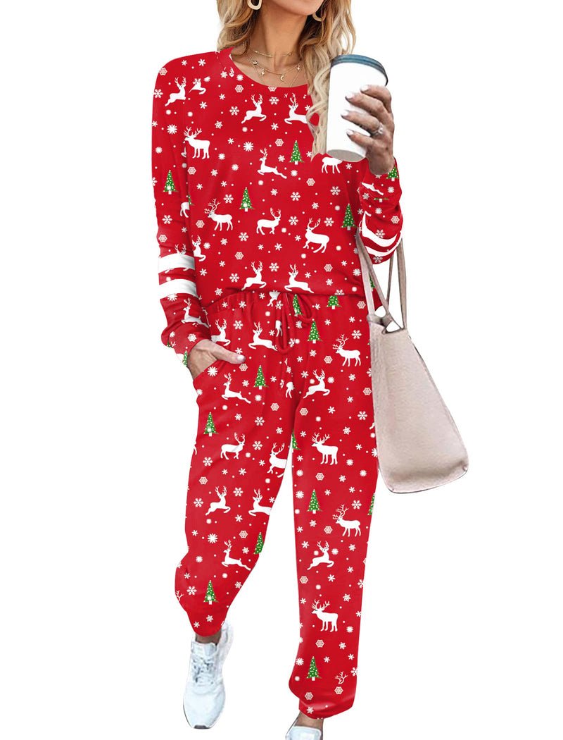 Red long-sleeve pajama set with reindeer and snowflake print; matching cuffed pants