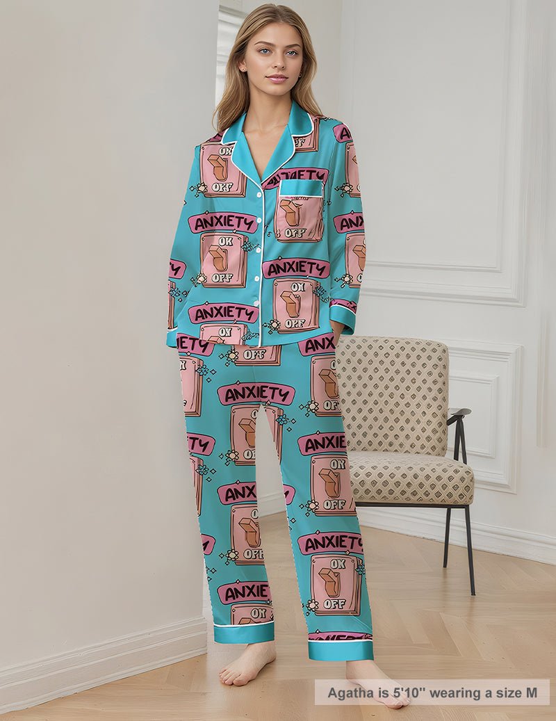 Women’s printed teal pajama set, long-sleeve button top and matching long pants