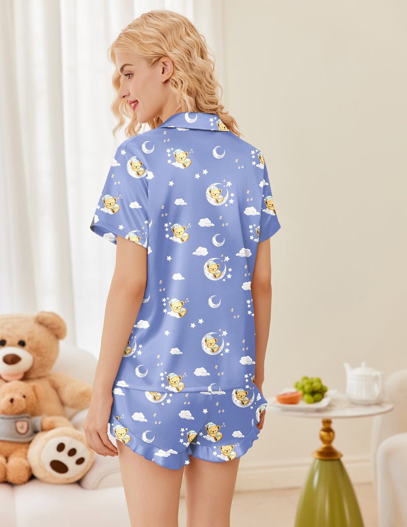 Printed satin pajama set, blue teddy bear star print, back view of short-sleeve top and shorts