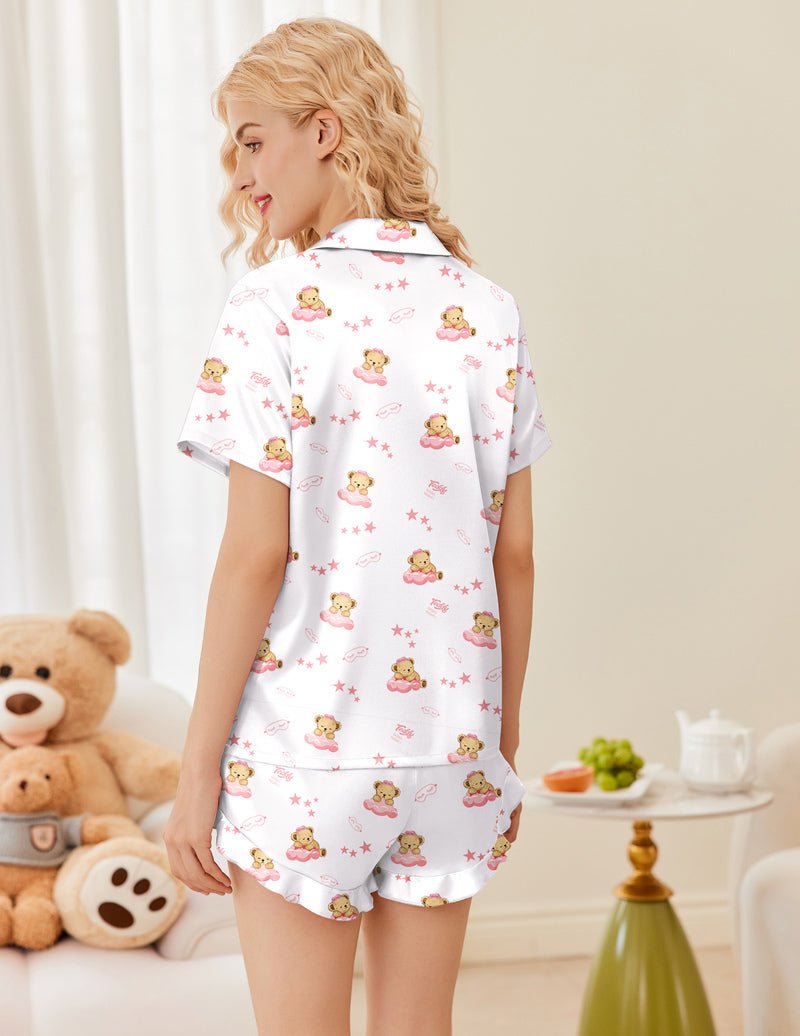 Printed satin pajama set, white teddy bear print, back view of short-sleeve top and shorts
