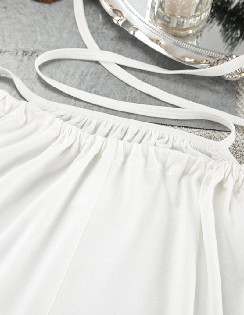 White drawstring lounge pants with elastic waist and thin tie straps