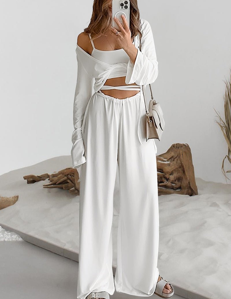 White lounge set with wrap-style crop top and drawstring wide-leg pants