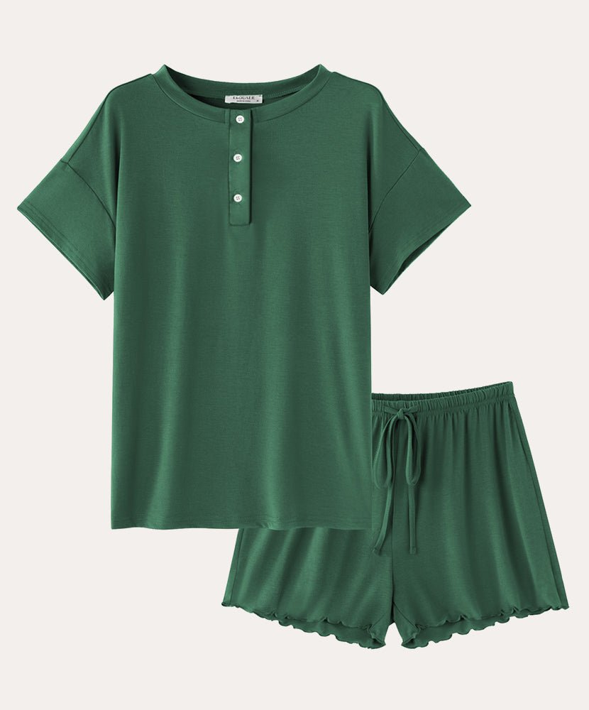 Cotton pajama set in green: short-sleeve henley top and drawstring sleep shorts.
