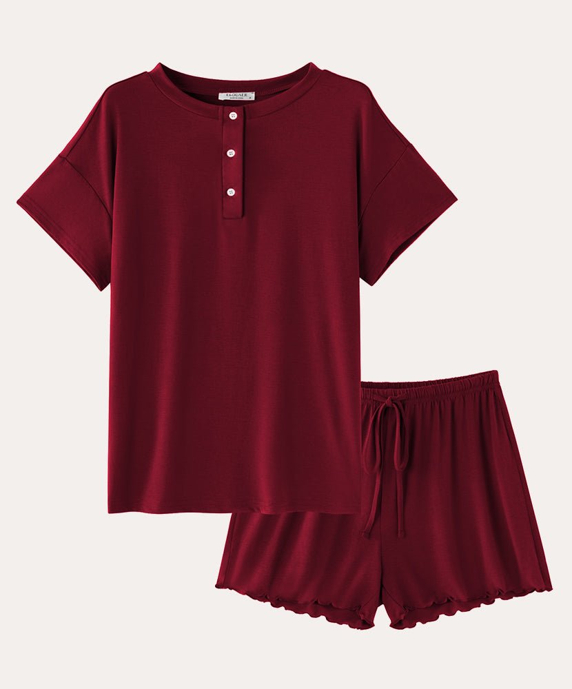 Cotton pajama set in wine red: short-sleeve henley top and drawstring sleep shorts.
