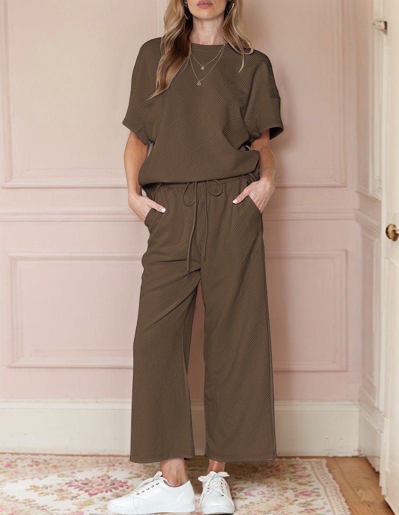 Brown textured loungewear set with short-sleeve top and wide-leg pants with drawstring