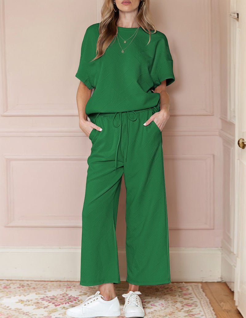 Green textured loungewear set featuring a short-sleeve top and wide-leg drawstring pants