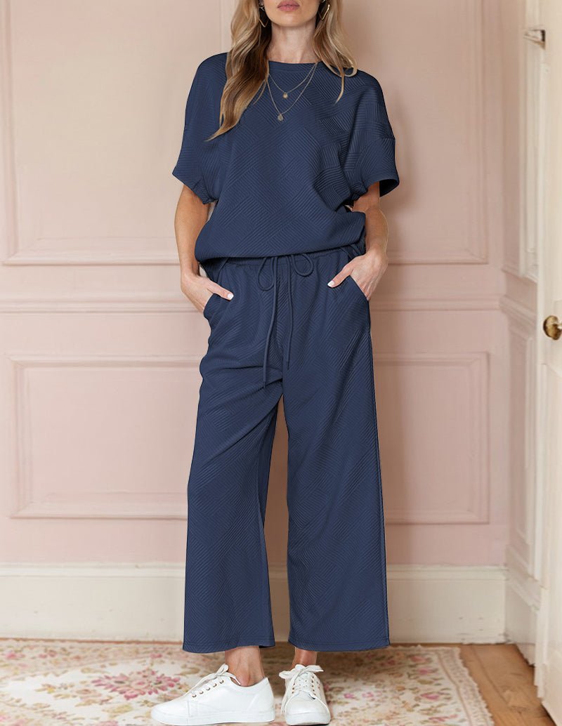 Navy textured loungewear set, short-sleeve top paired with wide-leg drawstring pants