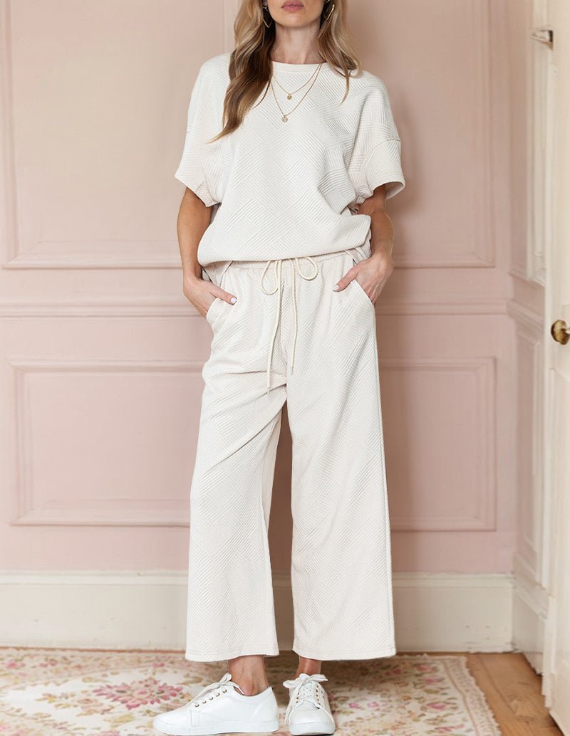 Off-white textured loungewear set, short-sleeve top and wide-leg drawstring pants