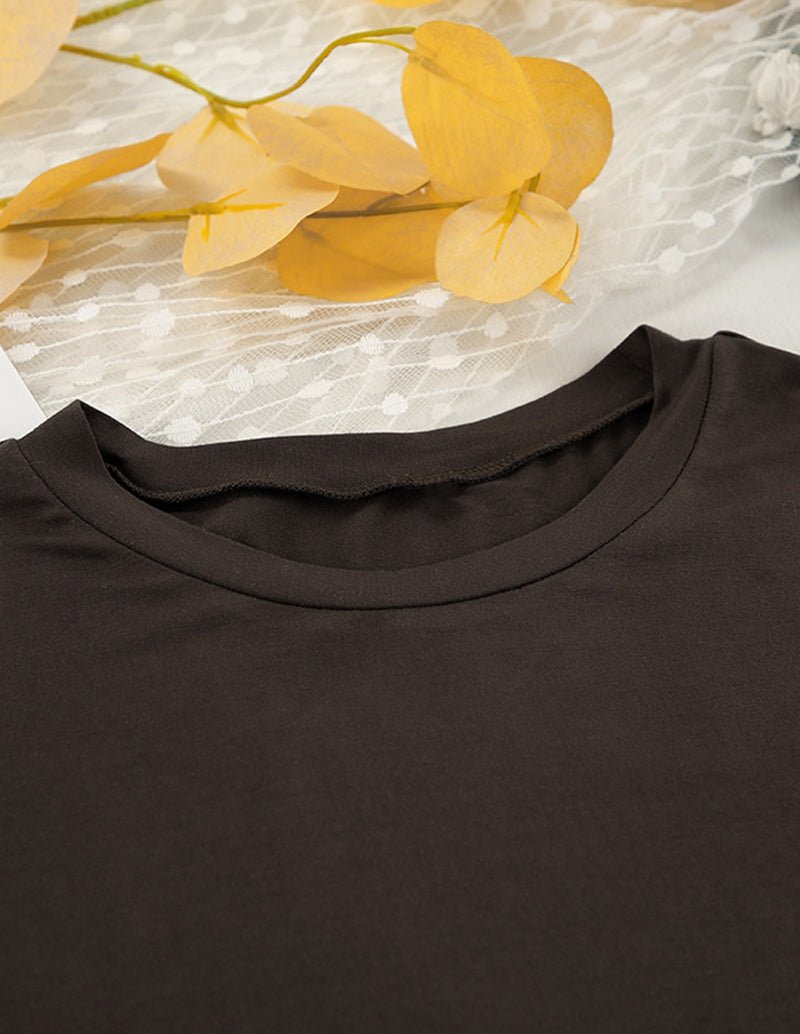 Black long-sleeve lounge top with crew neckline and smooth knit fabric